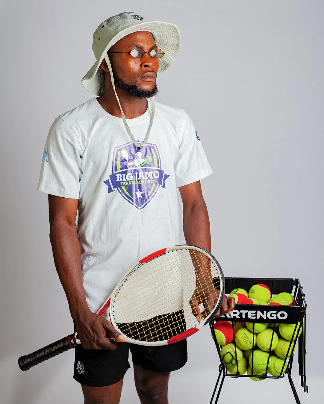 Coach BigJamo professional portrait on court