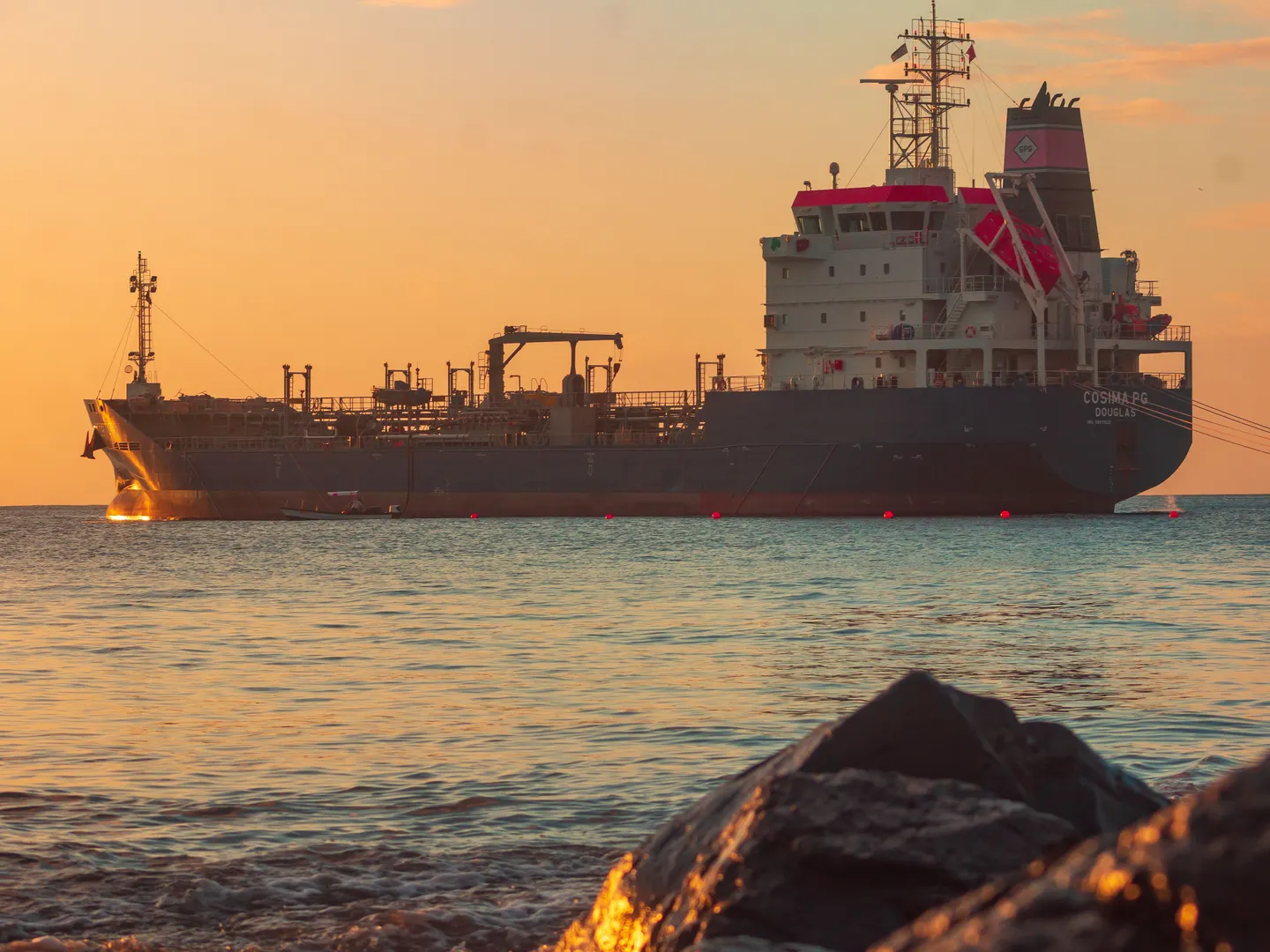 Large oil tanker at sunset