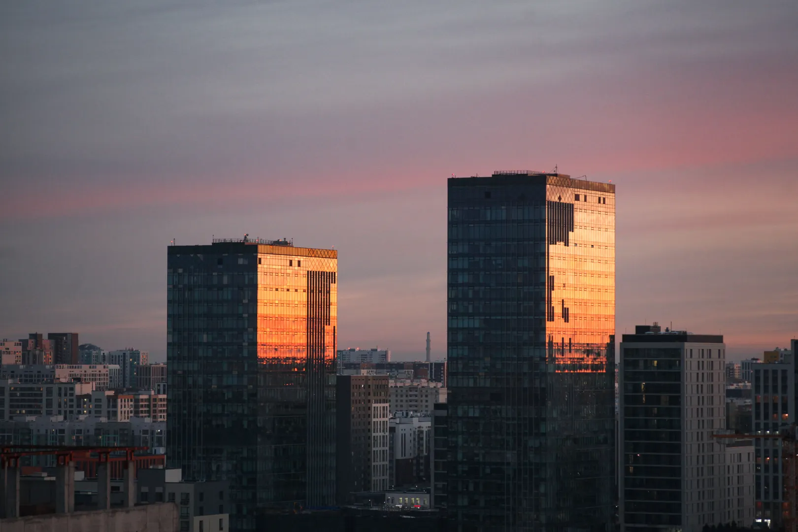 Modern glass facade at sunrise