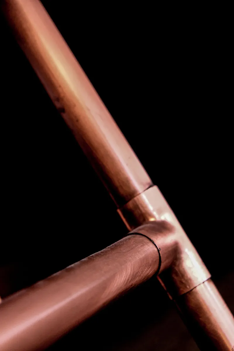 Industrial copper pipes close-up