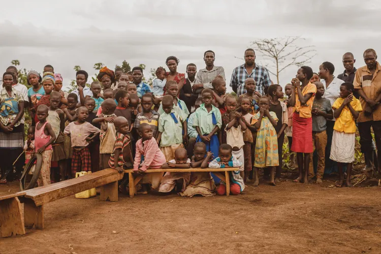 Kenyan youth engaging in community learning activities