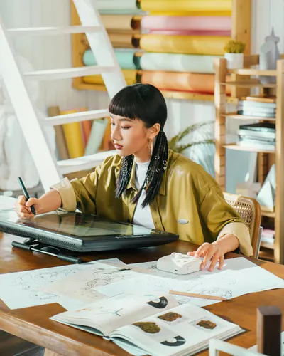 Artist working on digital tablet
