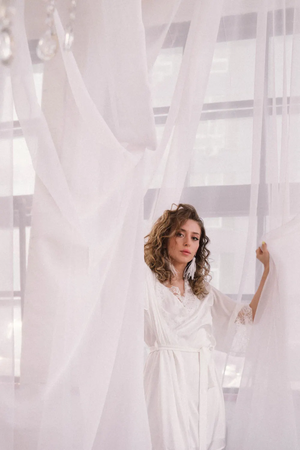 Ethereal white silk robe draping