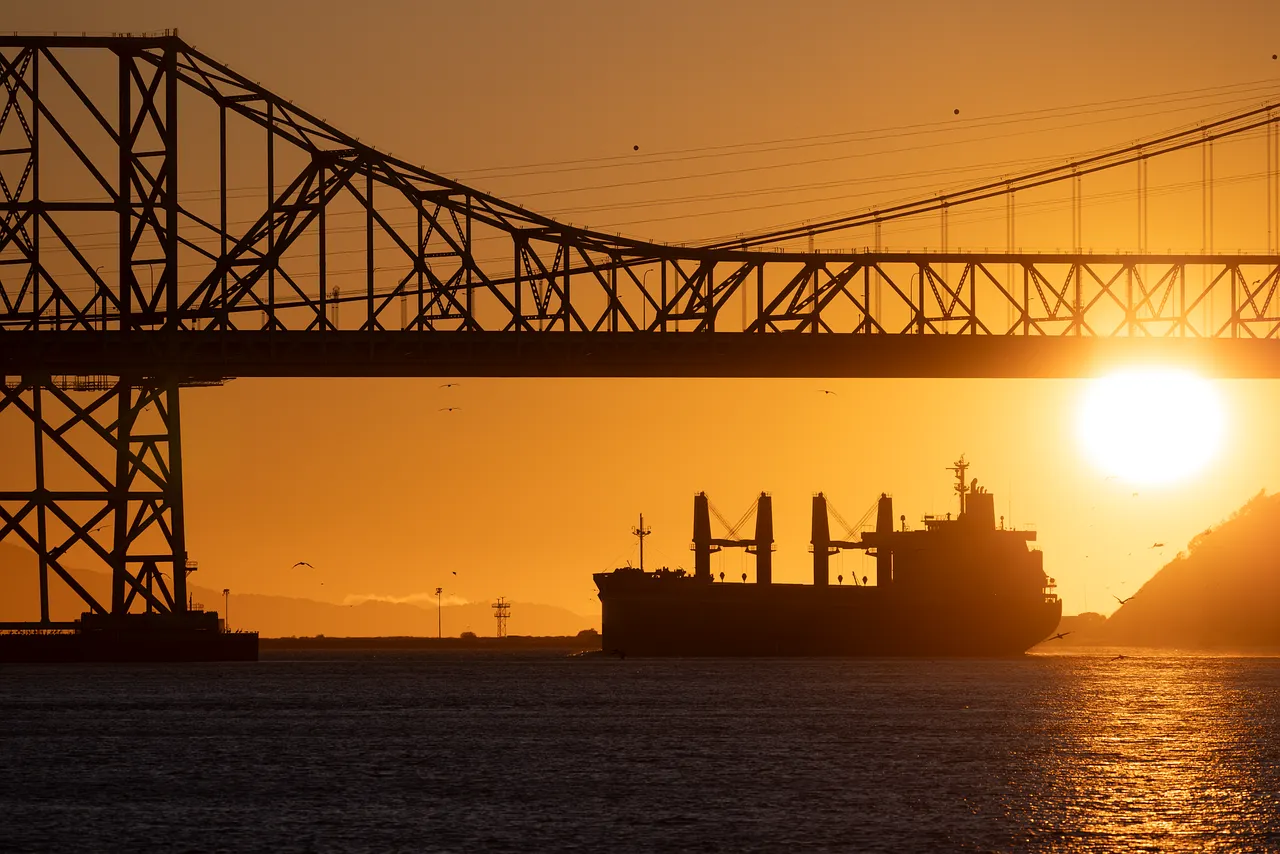 Oil tanker at sunset