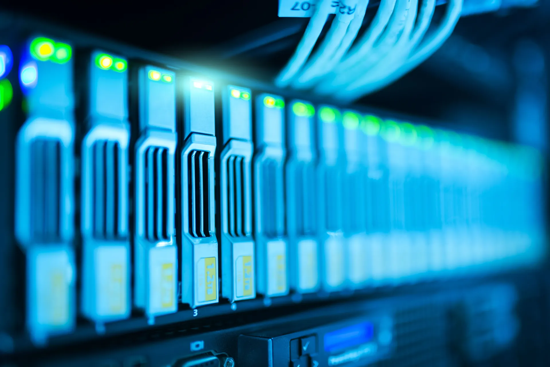 Glowing server racks in a modern data center representing high performance infrastructure