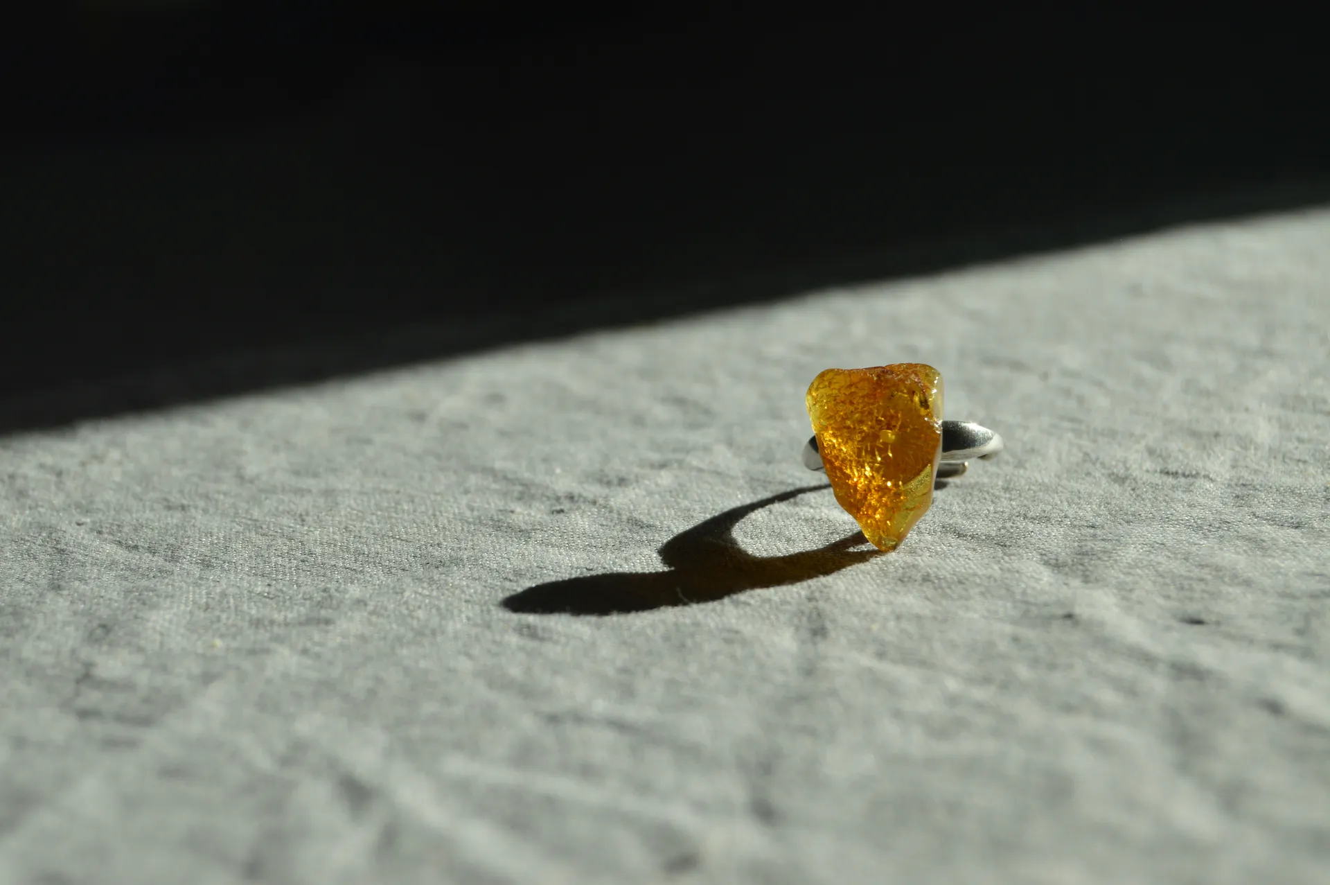 Artist silhouette against amber light