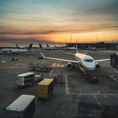 Modern airport terminal at sunset
