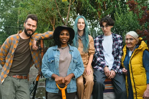 Diverse group of friends enjoying togetherness in an outdoor farm setting