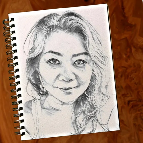 A sketch of a woman in a notebook