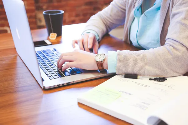 Professional working on a laptop representing digital growth
