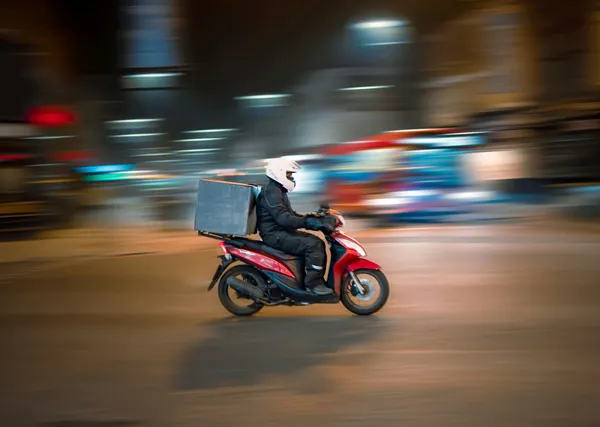 Mr. Okello Walter on his motorcycle