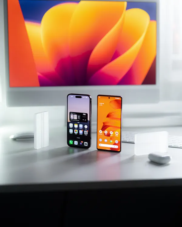 Smartphones on a desk representing mobile repair services