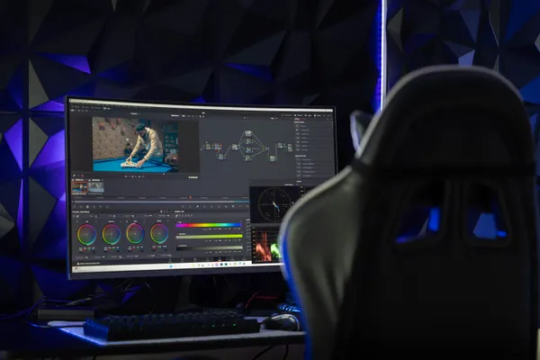 Curved monitor displaying video editing software