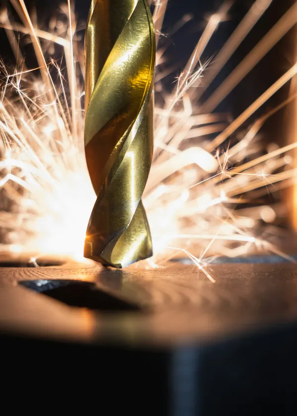 Industrial drill bit producing sparks