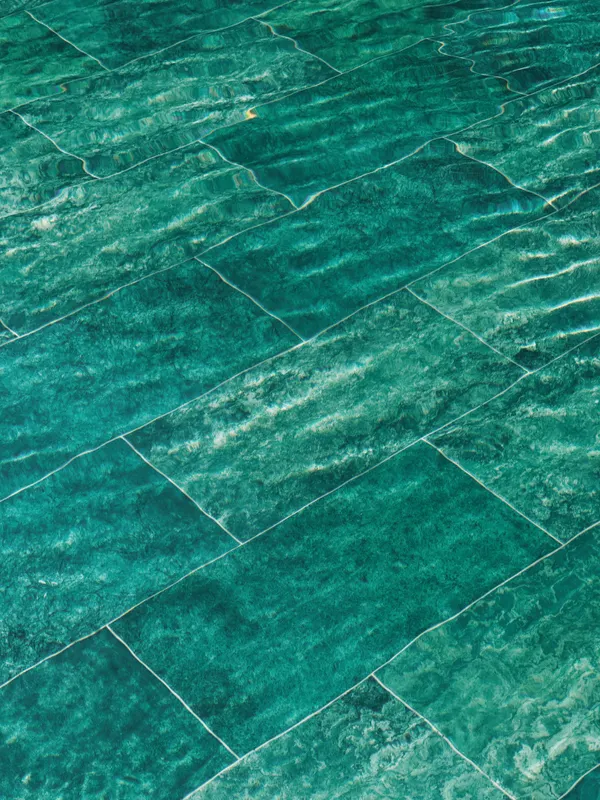 Vibrant turquoise ceramic tiles representing refined aesthetics