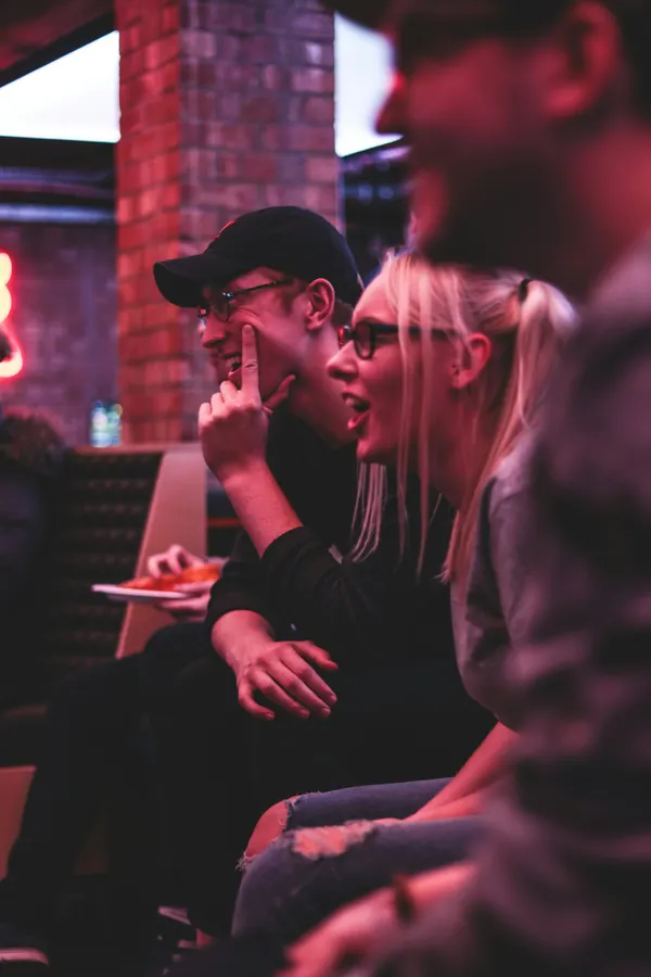 People smiling and socialising