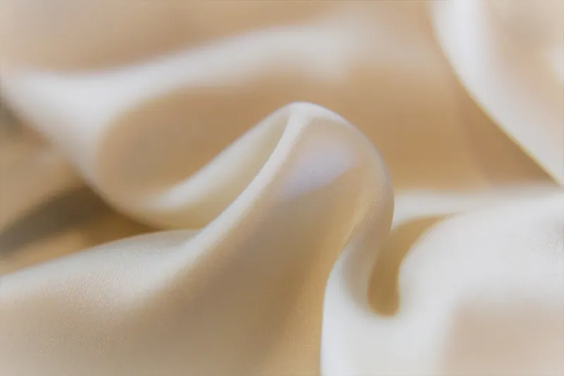 Soft focus silk texture representing our brand's aesthetic