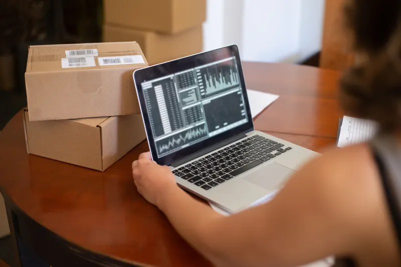 Small business owner managing orders