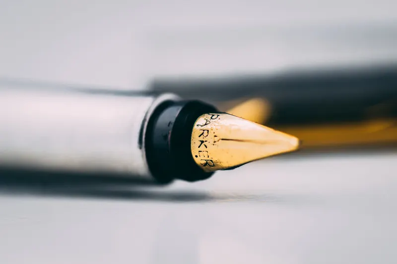 Fountain pen on ledger paper