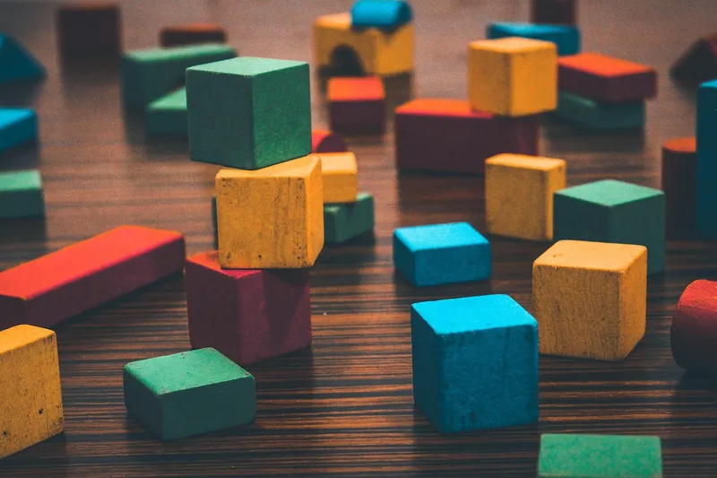 Child engaging with Montessori blocks