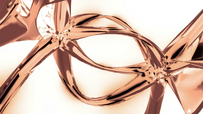 Matte rose gold wand massager on white marble