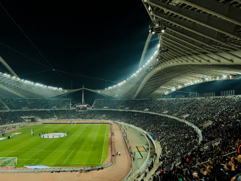 Crowded soccer stadium at night